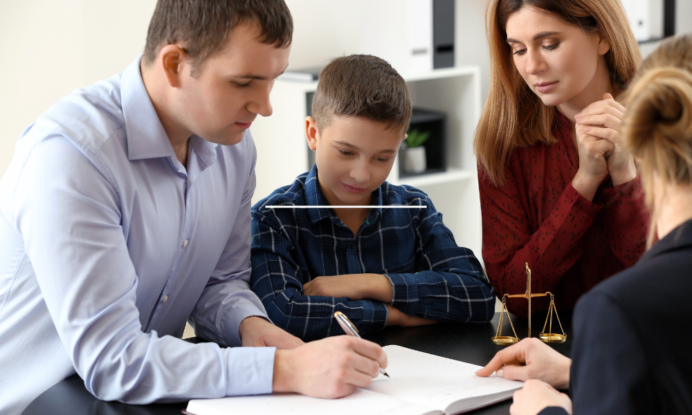 Image of a family working with a lawyer