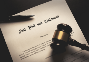 Image of a last will and testament document on a desk with a gavel and a miniature of a house