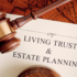 Image of a document reading Living Trust & Estate Planning with a gavel on top of it