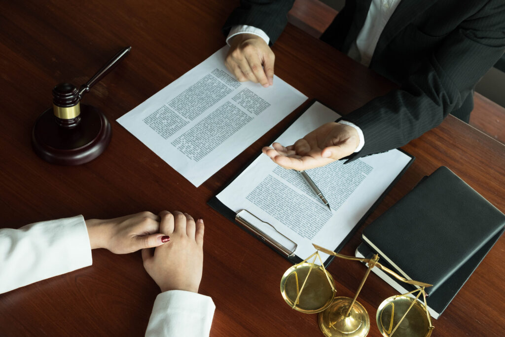 Image of a lawyer working with a client