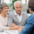 Image of a couple meeting with their estate lawyer